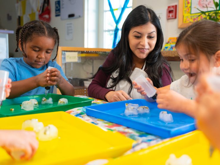 student teach children in child development center