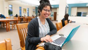 student working on laptop