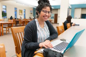 student working on laptop