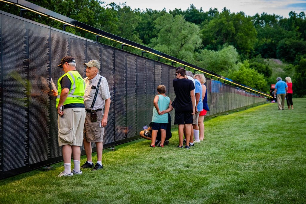 Veterans observing The Wall That Heals