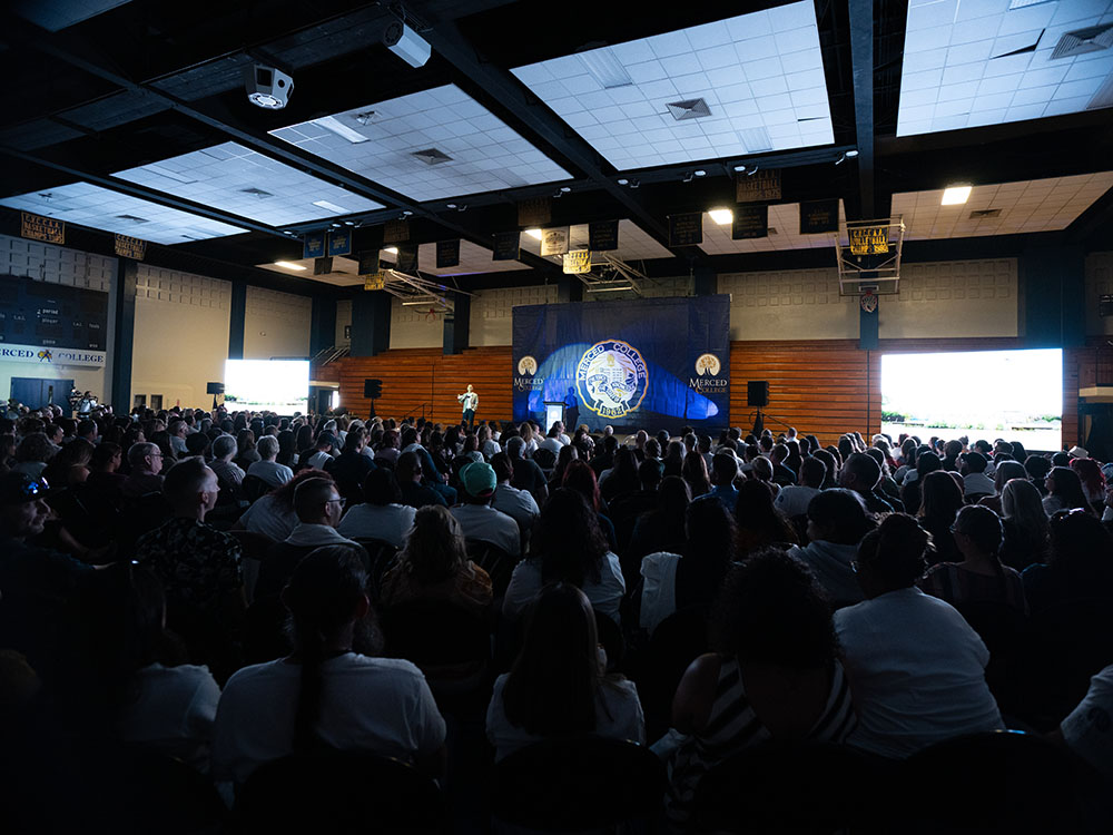 Merced College employees at the 2024 Convocation event inside the gym.