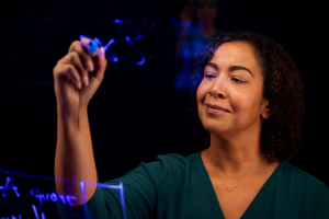 Woman using a magic dry-erase board